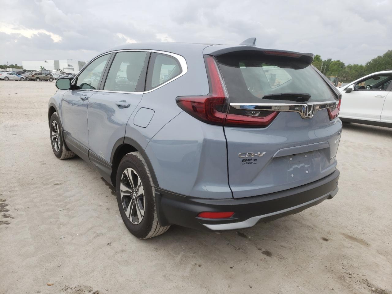 Photo 3 from auction – 2021 HONDA CR-V SE with VIN 5J6RW2H77ML025317