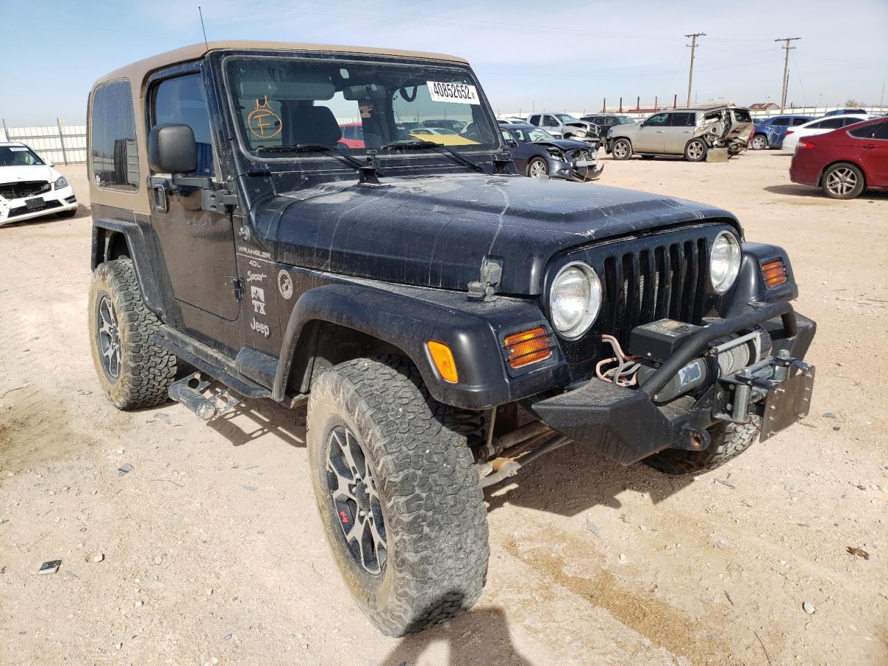 JEEP WRANGLER / 1999 with VIN 1J4FY19S0XP424013 - Photo from auction