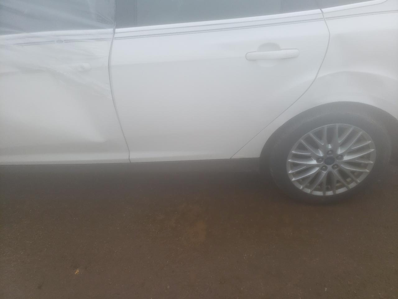 Foto 9 de la subasta – 2012 FORD FOCUS SEL con VIN 1FAHP3H25CL310644