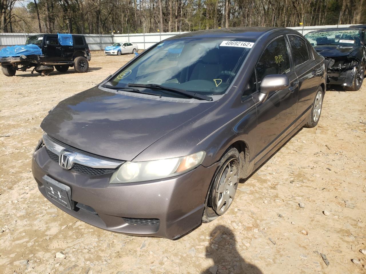 Photo 2 from auction – 2010 HONDA CIVIC LX with VIN 2HGFA1F52AH526239
