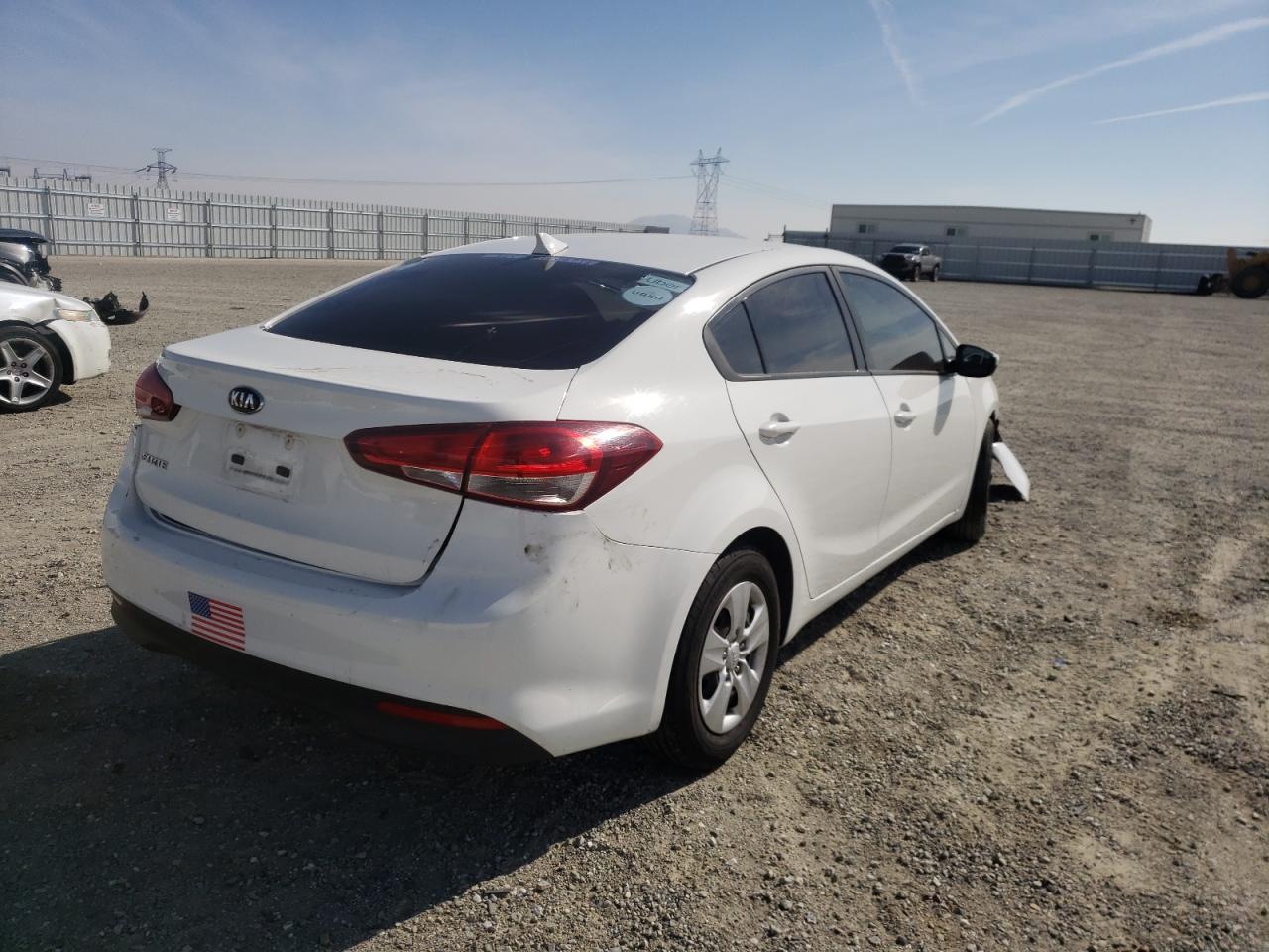Photo 4 from auction – 2018 KIA FORTE LX with VIN 3KPFK4A76JE211882