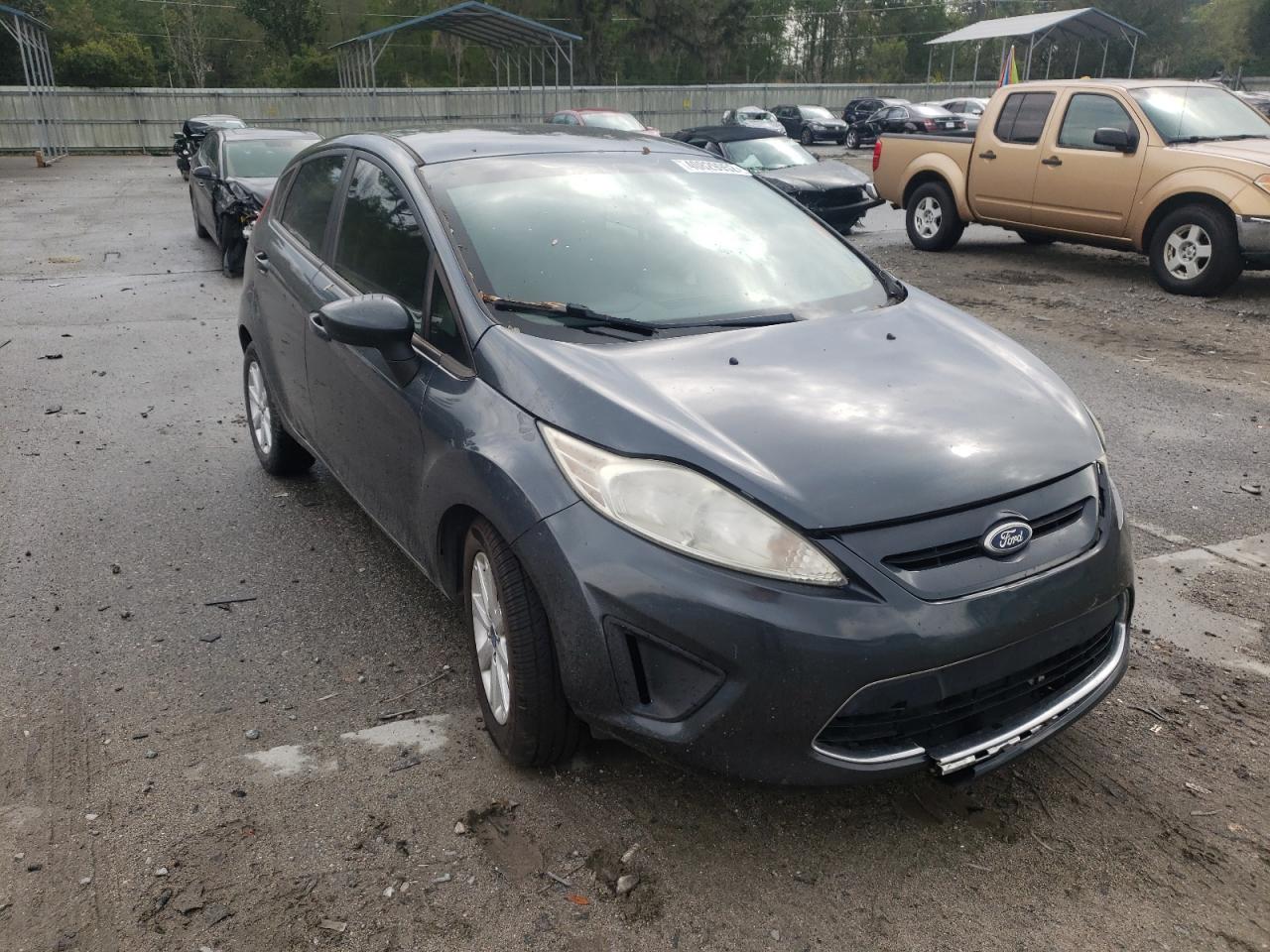 FORD FIESTA SE 2011 with VIN 3FADP4EJXBM124403 - Photo from auction