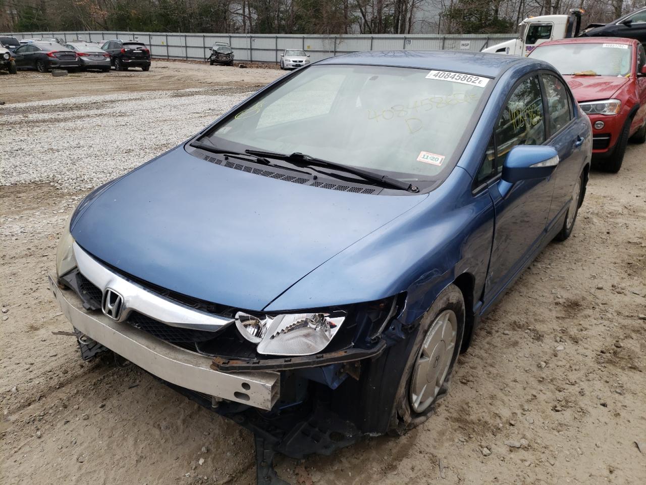 Photo 2 from auction – 2009 HONDA CIVIC HYBR with VIN JHMFA36259S008077