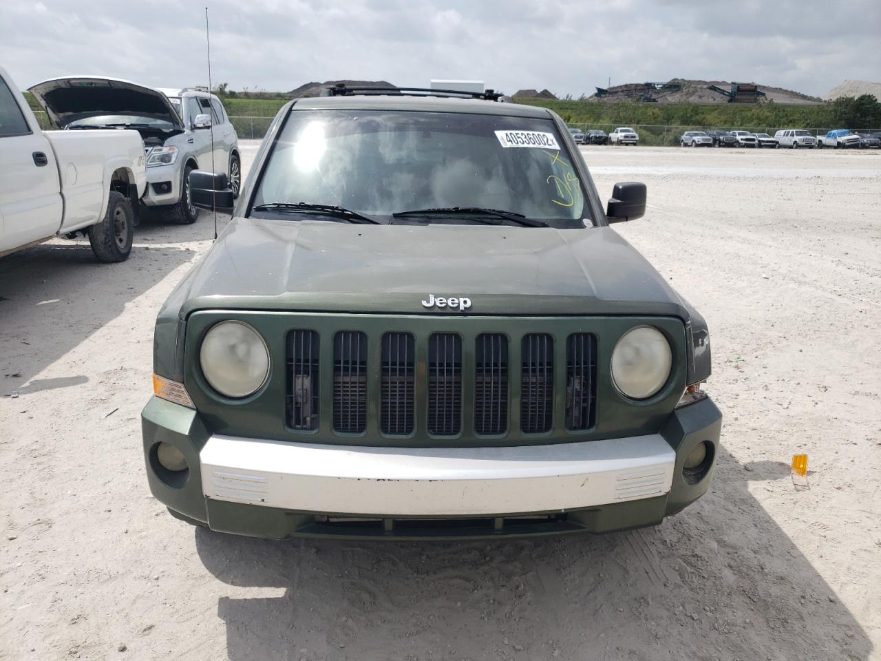 Photo 9 from auction – 2009 JEEP PATRIOT LI with VIN 1J8FT48B09D140899