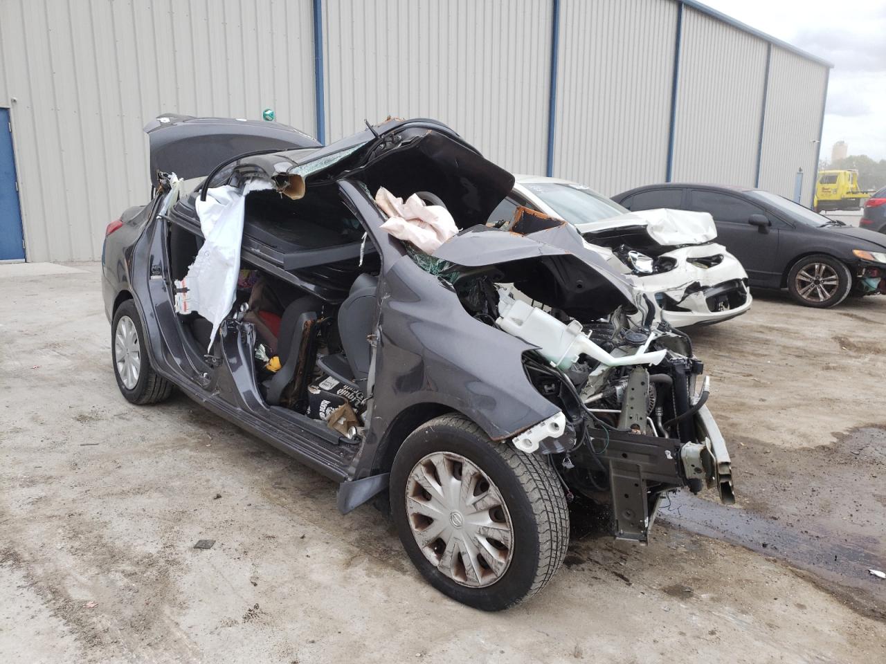 NISSAN VERSA 2015 with VIN 3N1CN7AP5FL800570 - Photo from auction