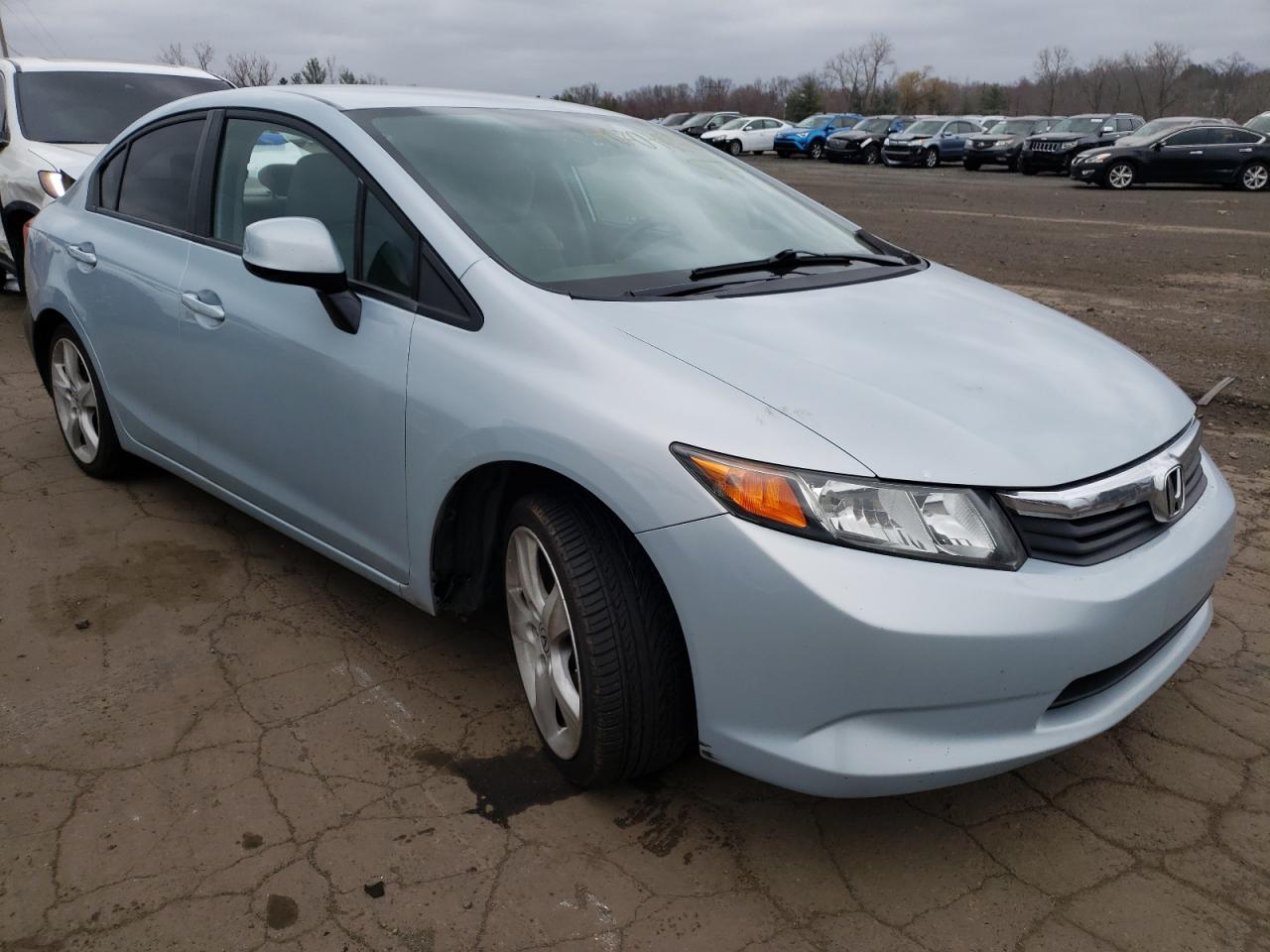 HONDA CIVIC LX 2012 with VIN 19XFB2F5XCE357216 - Photo from auction
