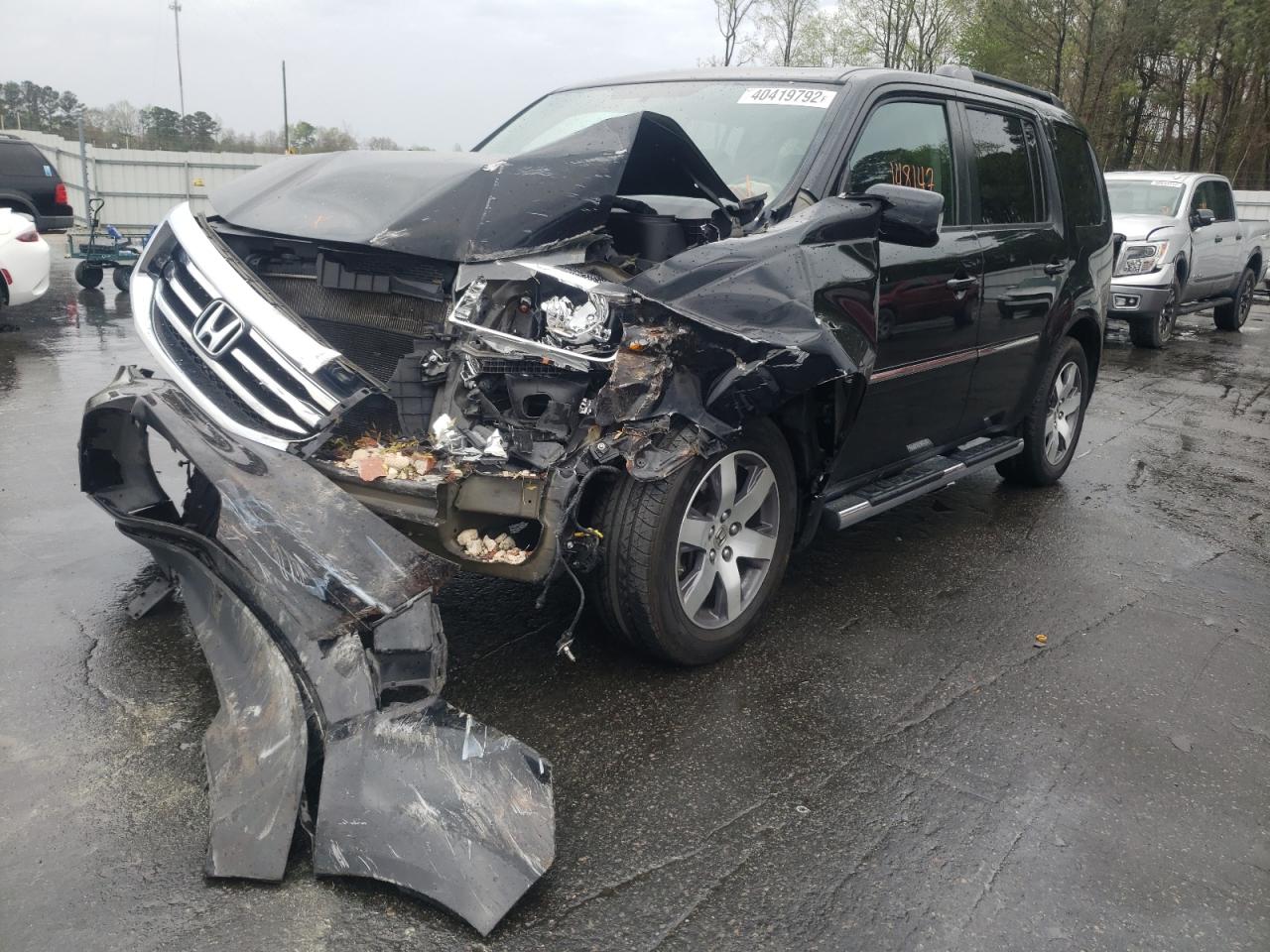 Photo 2 from auction – 2015 HONDA PILOT TOUR with VIN 5FNYF4H99FB052314