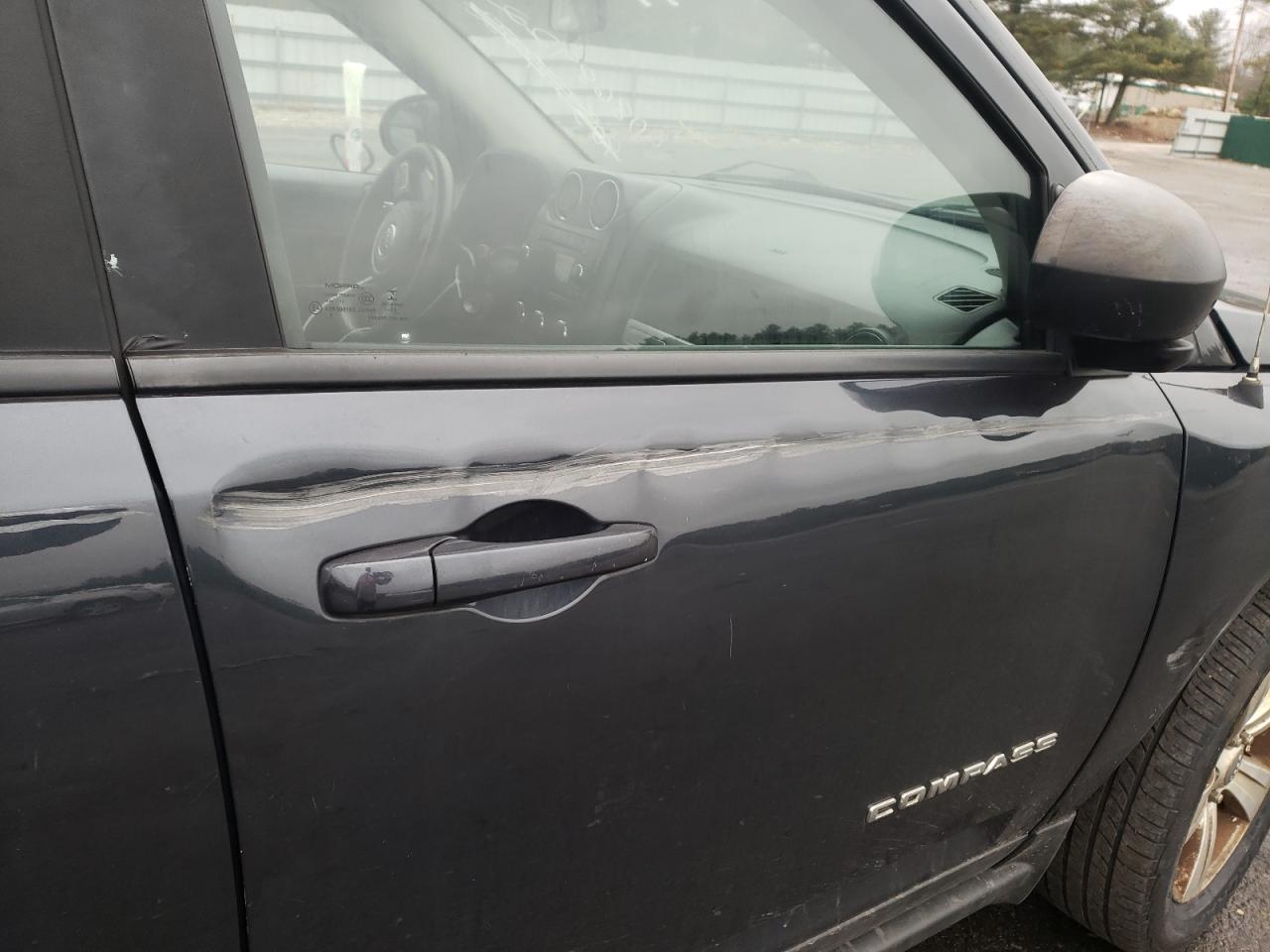 Photo 9 from auction – 2014 JEEP COMPASS SP with VIN 1C4NJDBB7ED621499