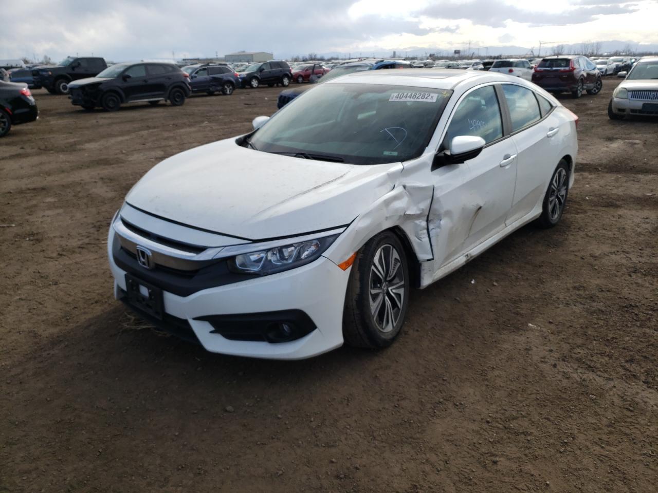Photo 2 from auction – 2016 HONDA CIVIC EXL with VIN 19XFC1F74GE210839