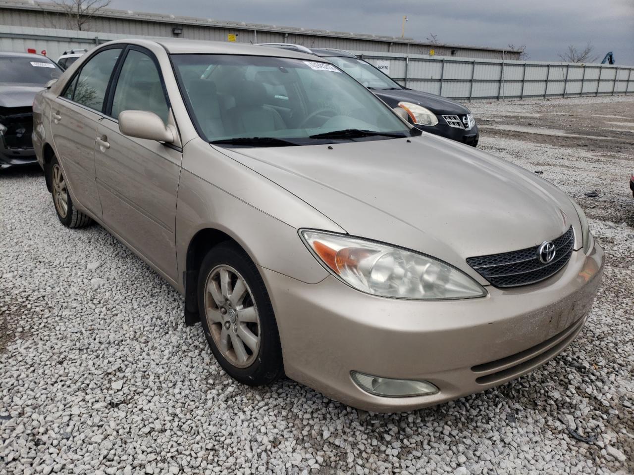 TOYOTA CAMRY LE 2003 with VIN 4T1BF32K53U042275 - Photo from auction
