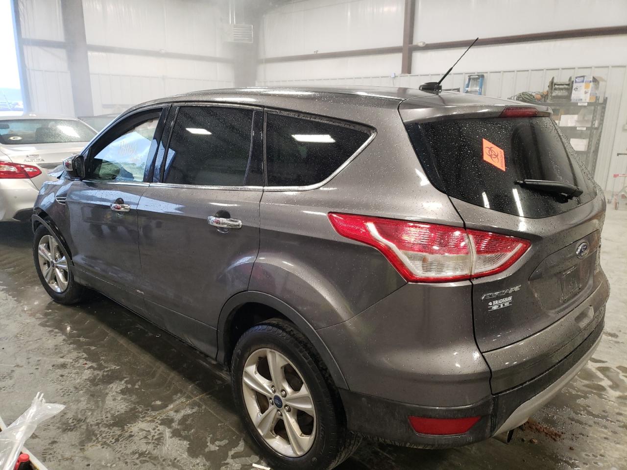 Photo 3 from auction – 2013 FORD ESCAPE with VIN 1FMCU0GX5DUC19471