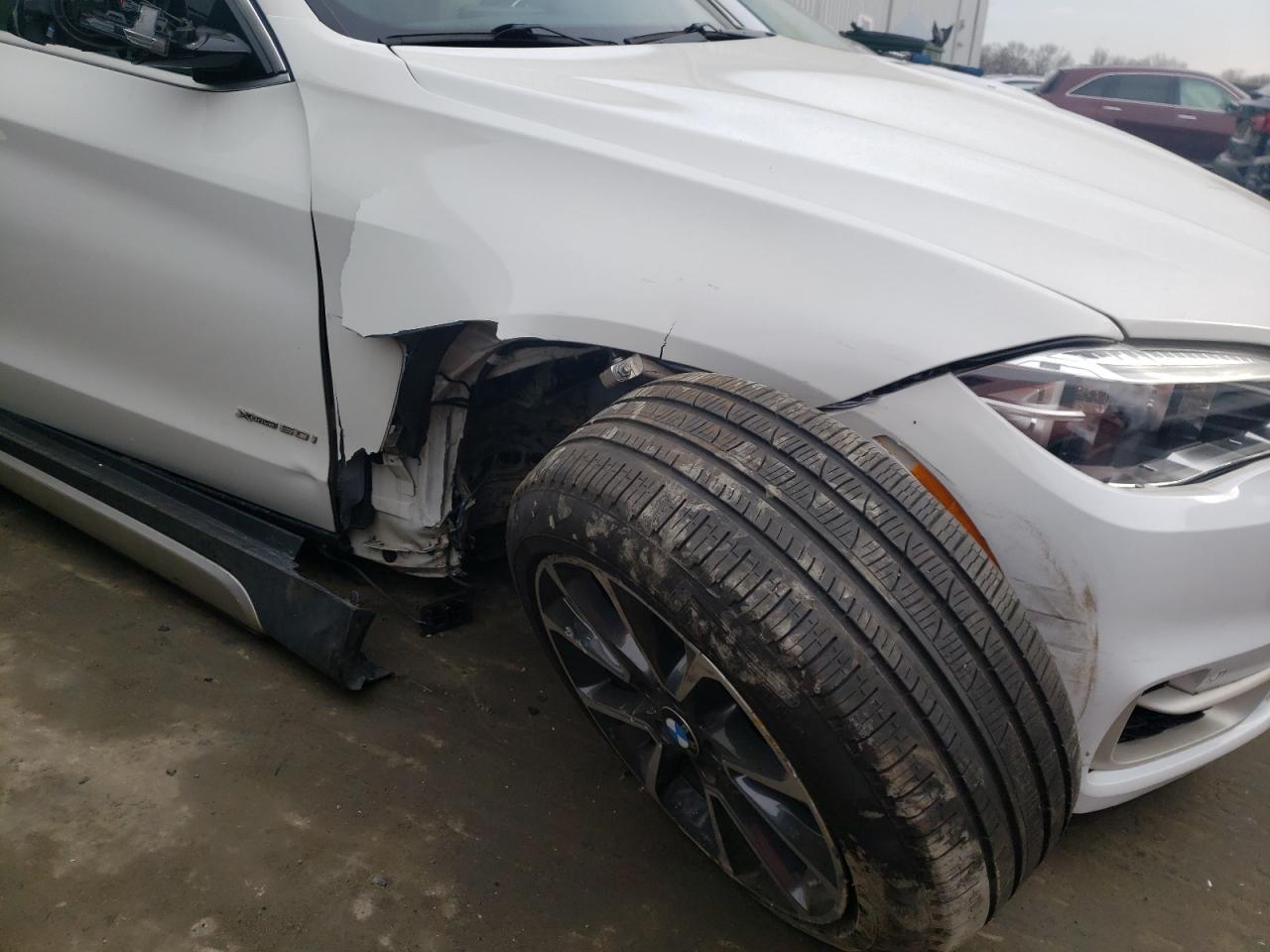 Photo 9 from auction – 2018 BMW X5 XDRIVE5 with VIN 5UXKR6C59JL080289
