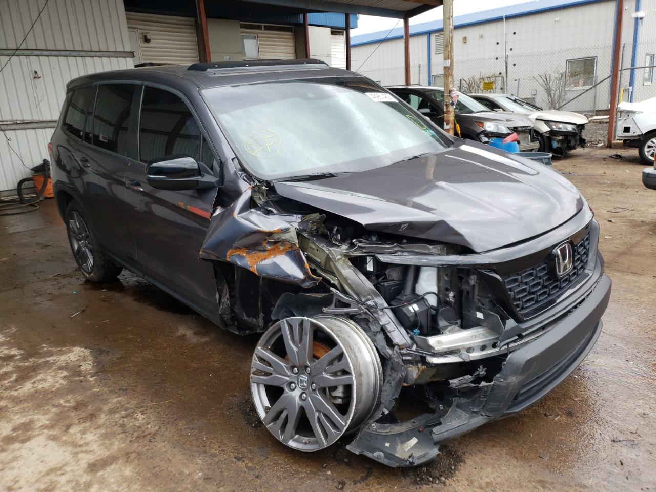 HONDA PASSPORT E 2019 with VIN 5FNYF8H50KB011312 - Photo from auction