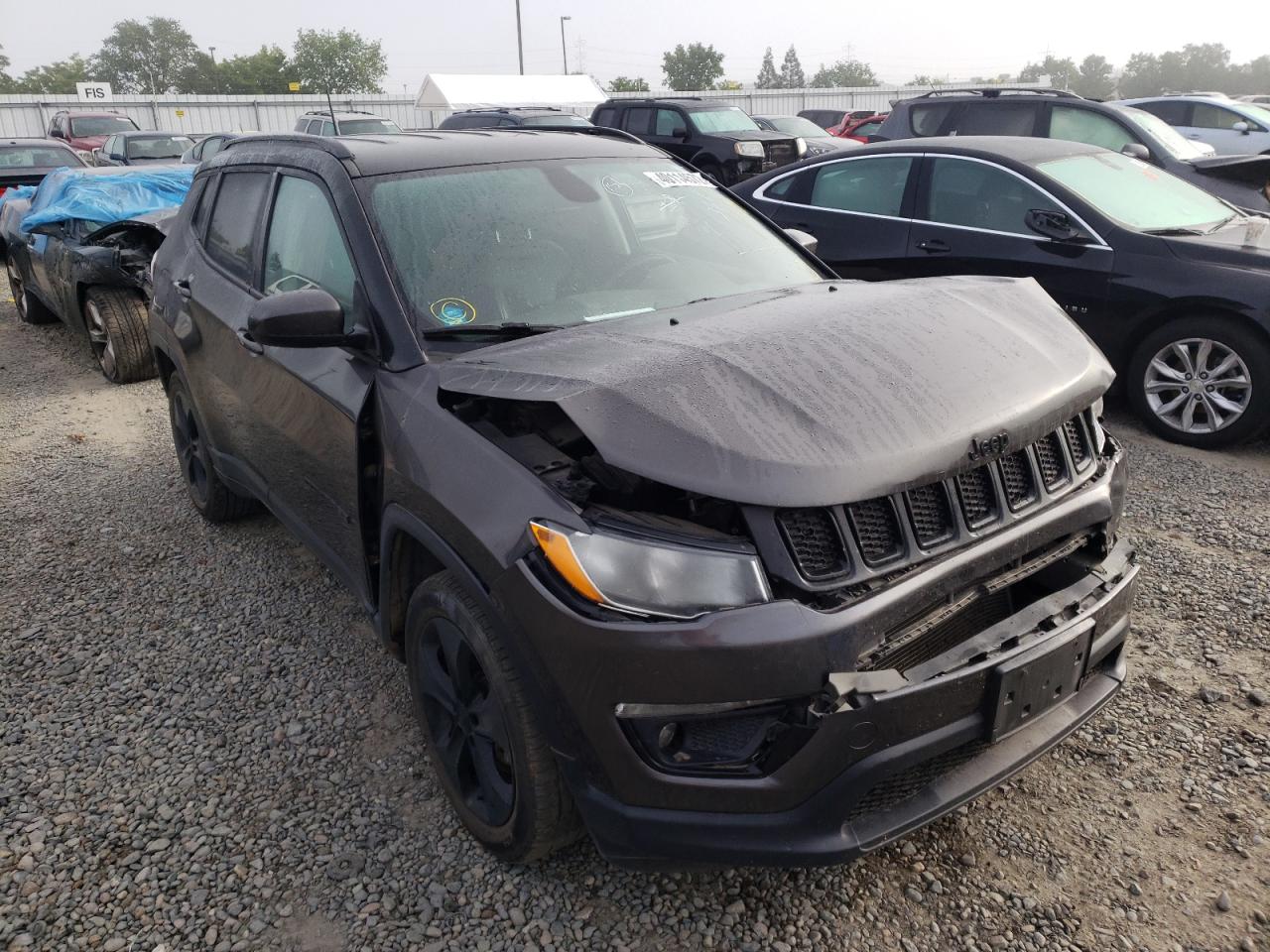 JEEP COMPASS LA 2019 with VIN 3C4NJCBB0KT699557 - Photo from auction