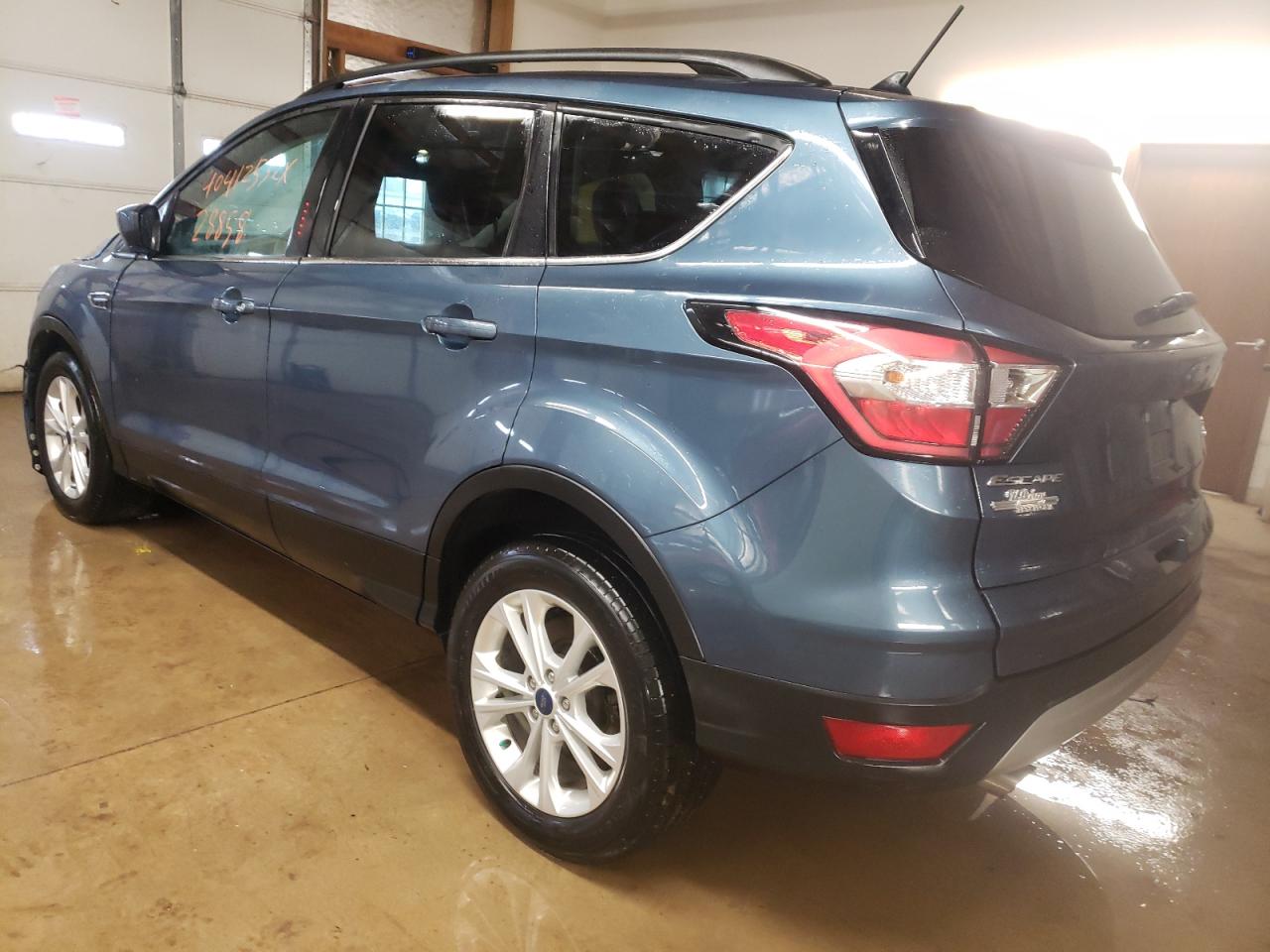 Photo 3 from auction – 2018 FORD ESCAPE SE with VIN 1FMCU0GD0JUA80481