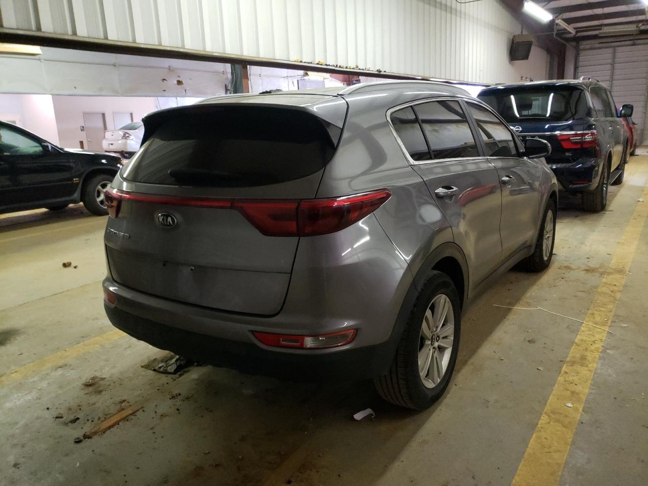 Photo 4 from auction – 2018 KIA SPORTAGE L with VIN KNDPM3AC5J7344896