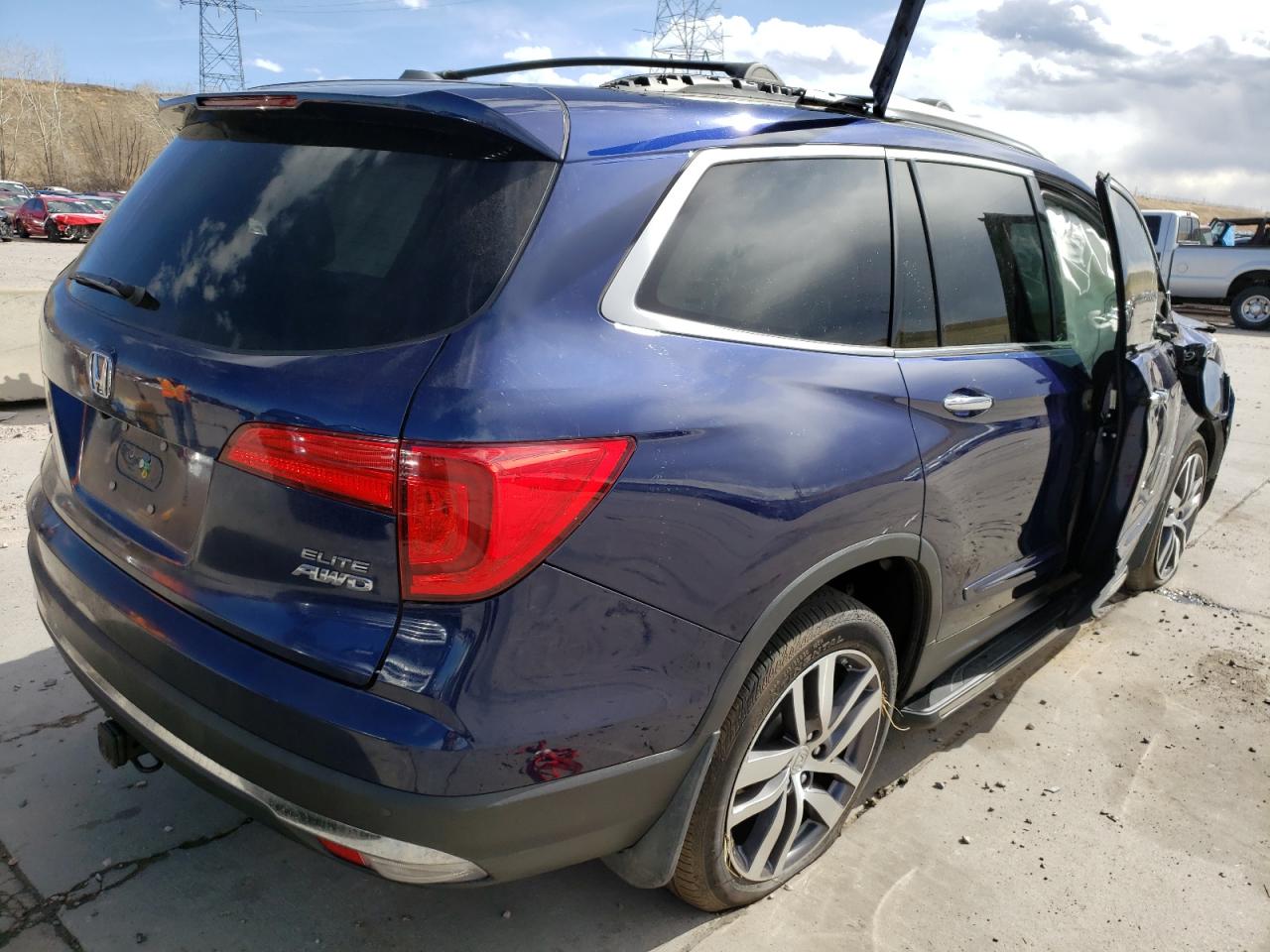 Photo 4 from auction – 2016 HONDA PILOT ELIT with VIN 5FNYF6H00GB123074