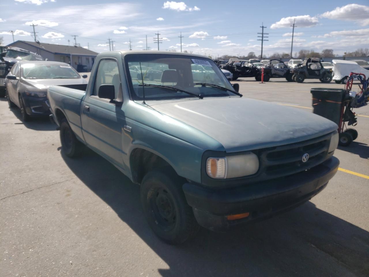 MAZDA B2300 1994 with VIN 4F4CR12AXRTM69792 - Photo from auction