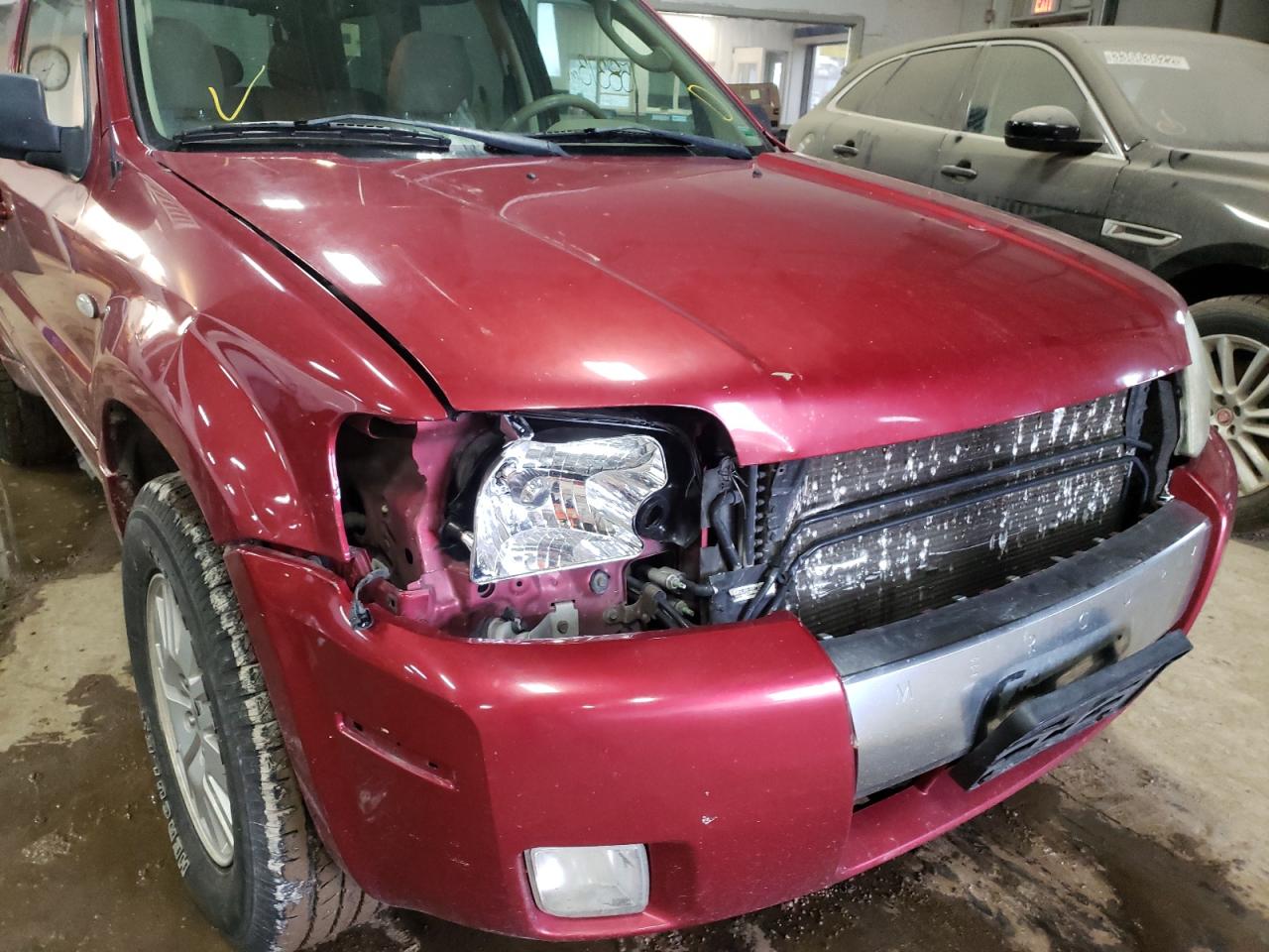 Photo 9 from auction – 2006 MERCURY MARINER with VIN 4M2YU57196DJ03853