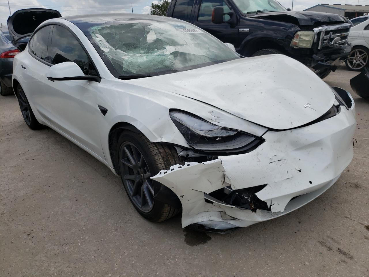 TESLA MODEL 3 2022 with VIN 5YJ3E1EBXNF159096 - Photo from auction