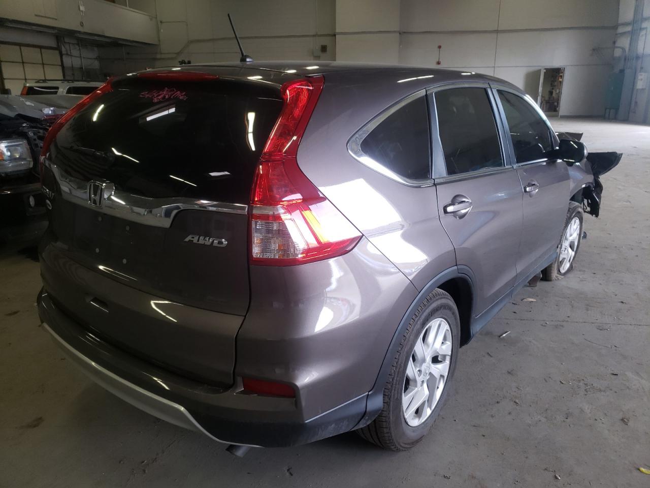 Photo 4 from auction – 2015 HONDA CR-V EX with VIN 2HKRM4H53FH664677