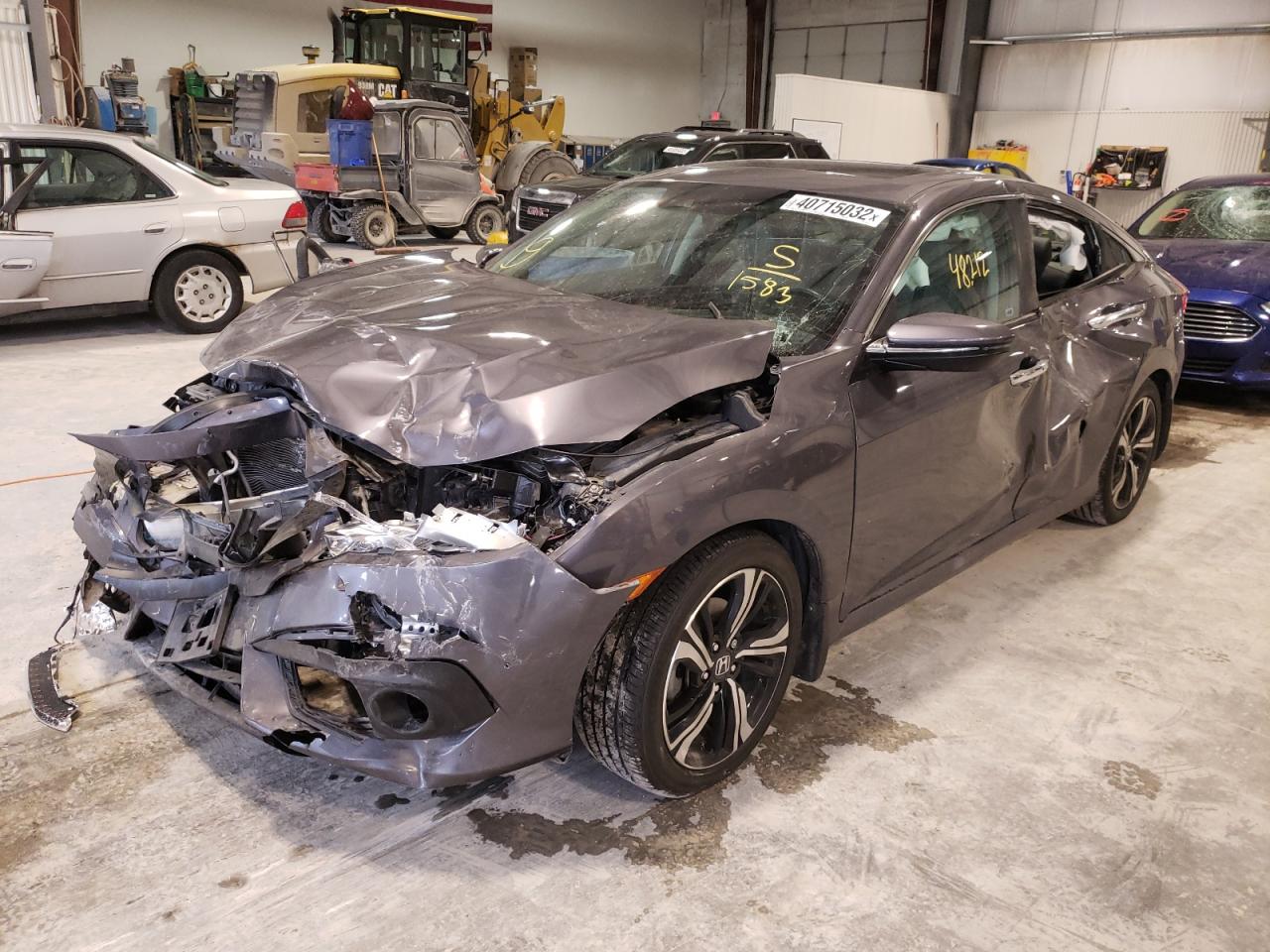 Photo 2 from auction – 2016 HONDA CIVIC TOUR with VIN 2HGFC1F93GH641583