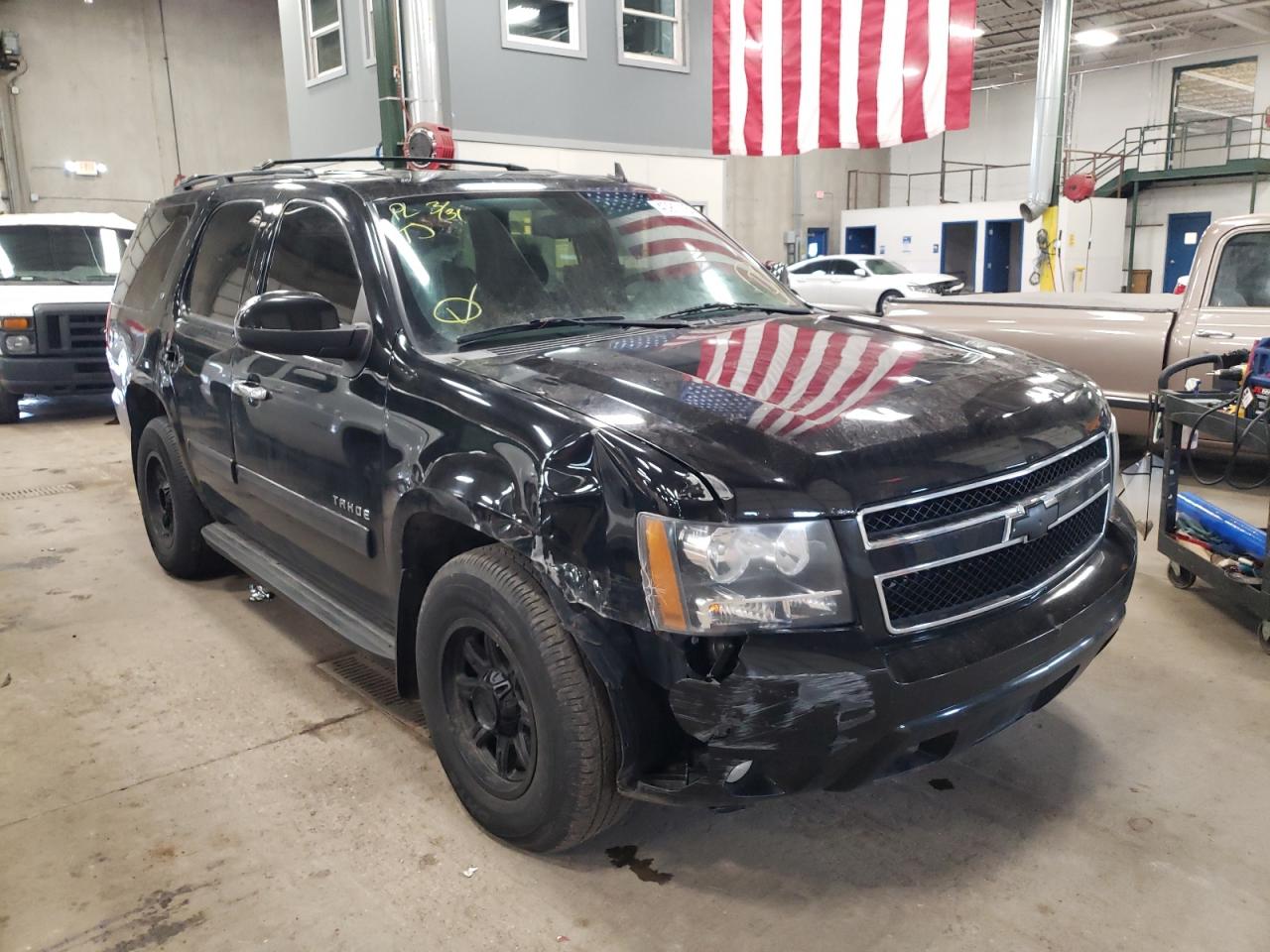 CHEVROLET TAHOE 2011 with VIN 1GNSKBE08BR151293 - Photo from auction