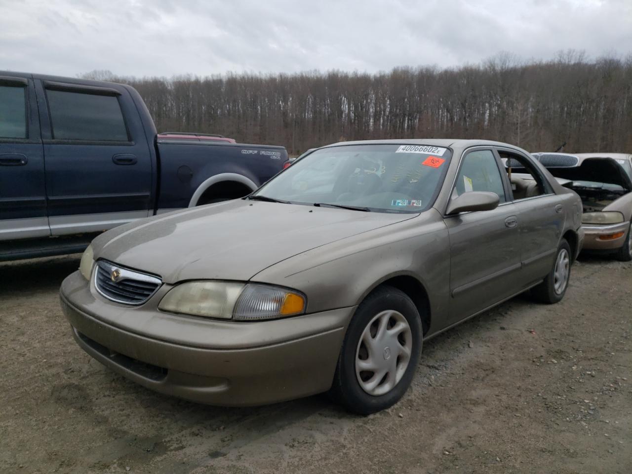 Photo 2 from auction – 1998 MAZDA 626 DX with VIN 1YVGF22C5W5770961