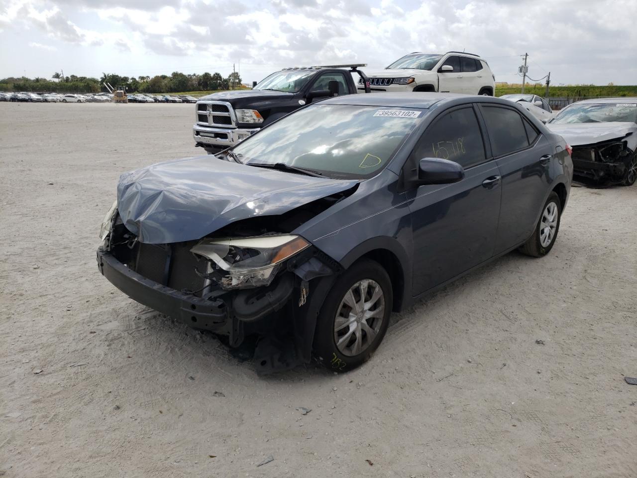 Photo 2 from auction – 2014 TOYOTA COROLLA L with VIN 2T1BURHE3EC029202