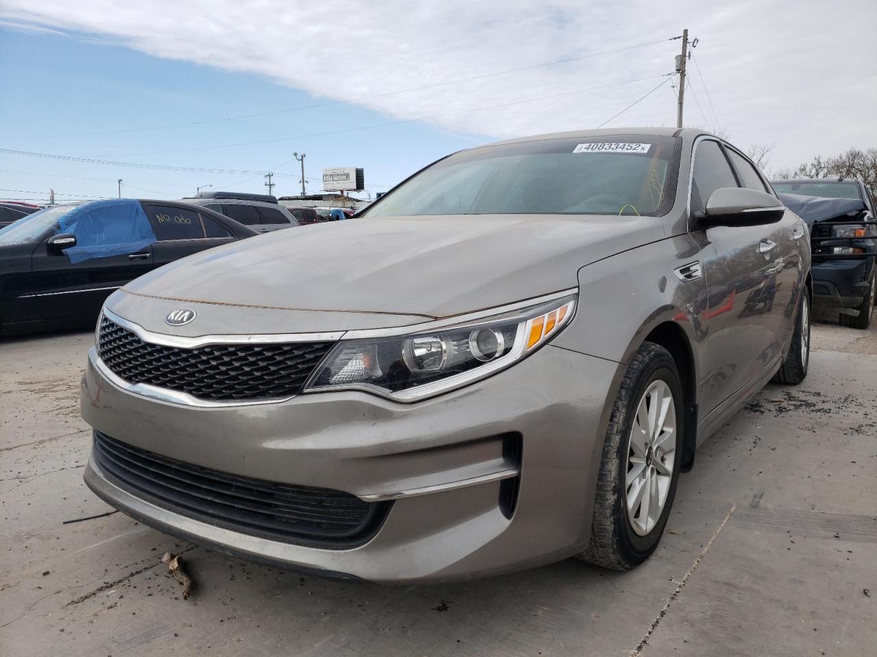 Photo 2 from auction – 2016 KIA OPTIMA LX with VIN 5XXGT4L31GG099276