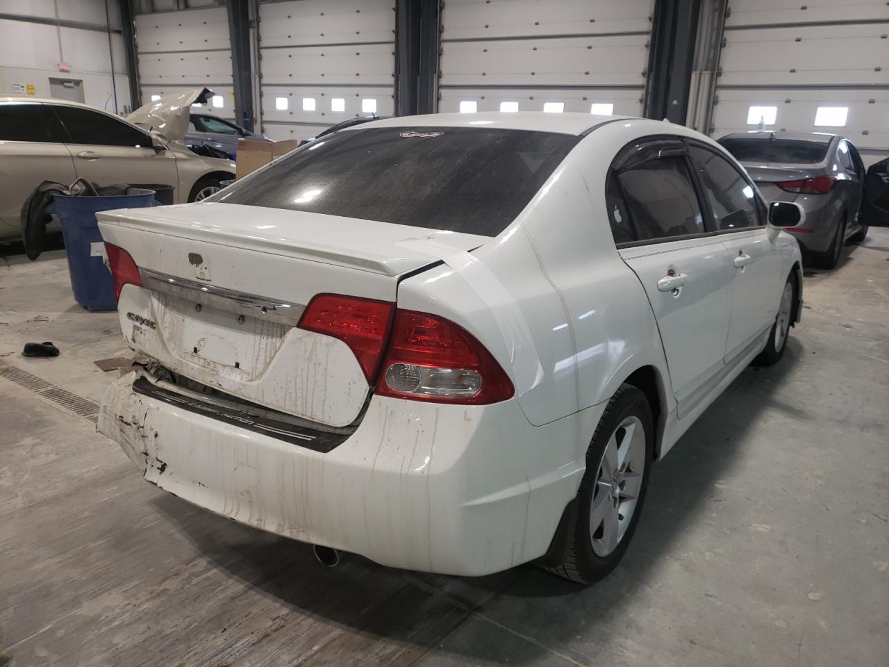 Photo 4 from auction – 2010 HONDA CIVIC with VIN 19XFA1F68AE017582