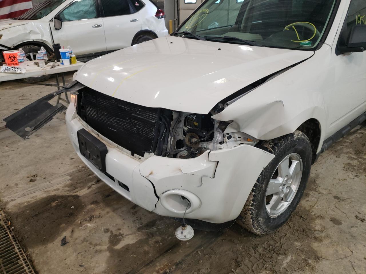 Photo 9 from auction – 2010 FORD ESCAPE XLT with VIN 1FMCU0DG2AKA93159