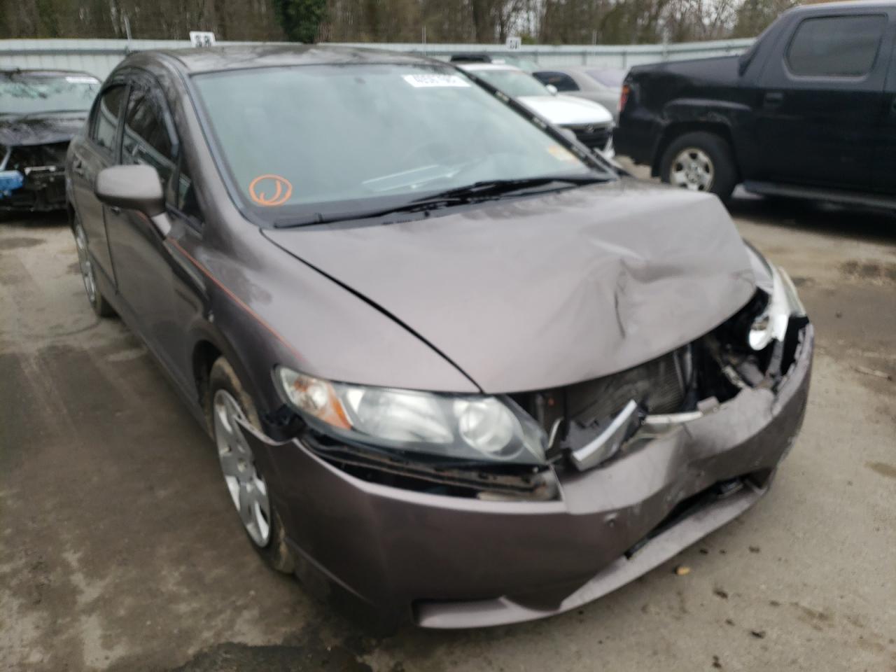 HONDA CIVIC LX 2011 with VIN 2HGFA1F58BH511553 - Photo from auction