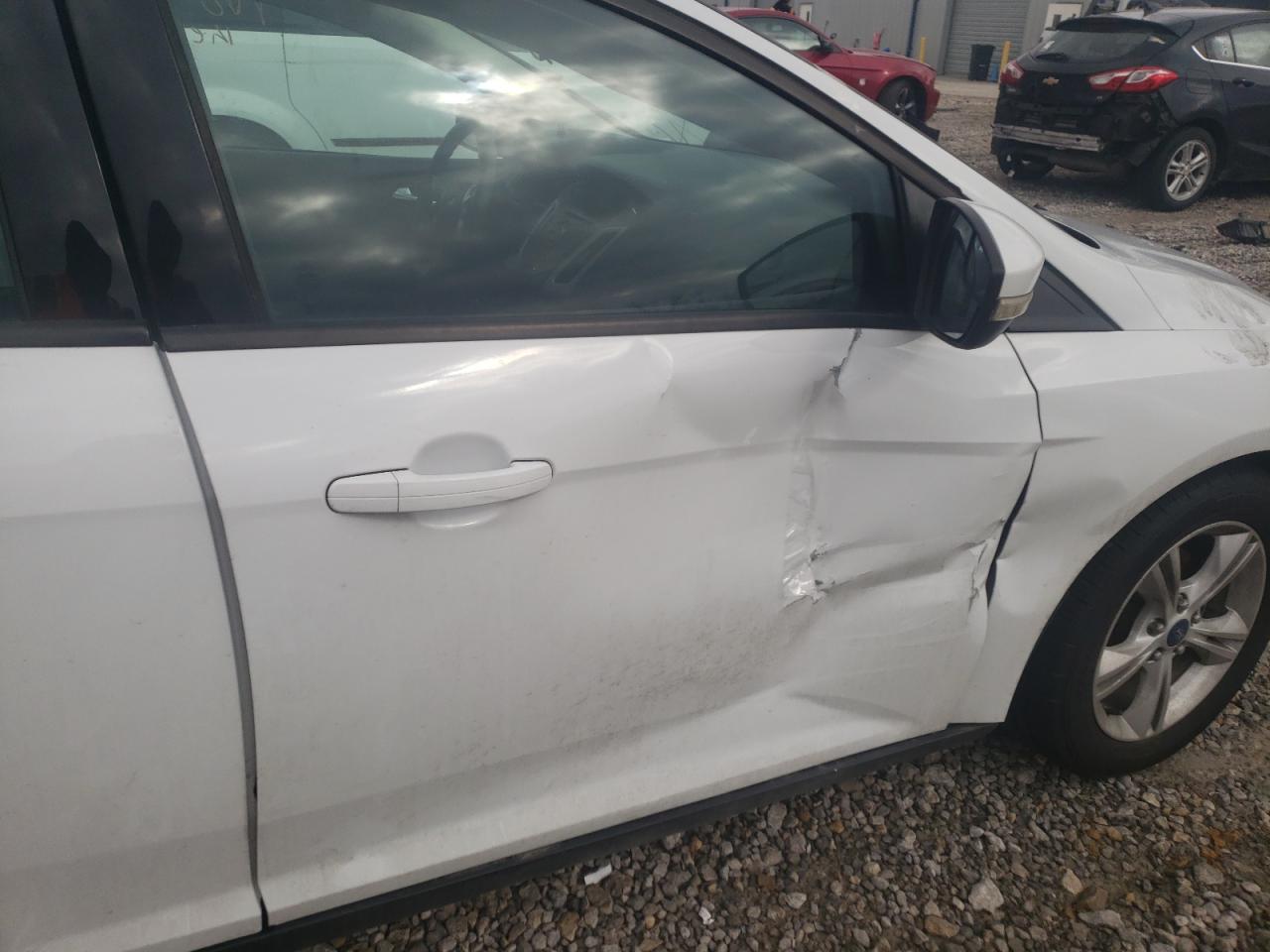 Photo 9 from auction – 2014 FORD FOCUS SE with VIN 1FADP3F25EL432280