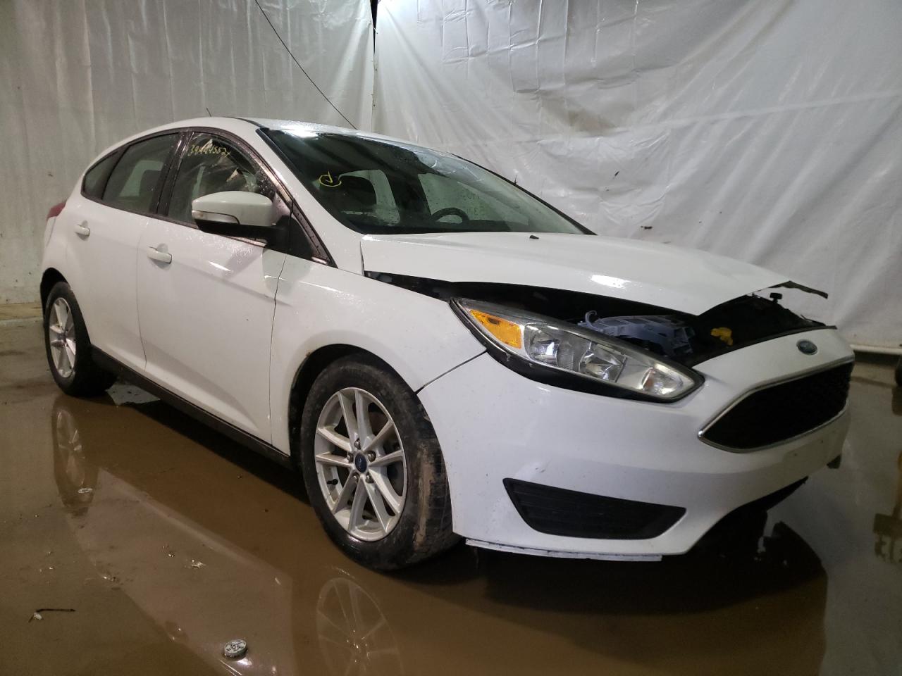 FORD FOCUS SE 2017 with VIN 1FADP3K27HL249022 - Photo from auction