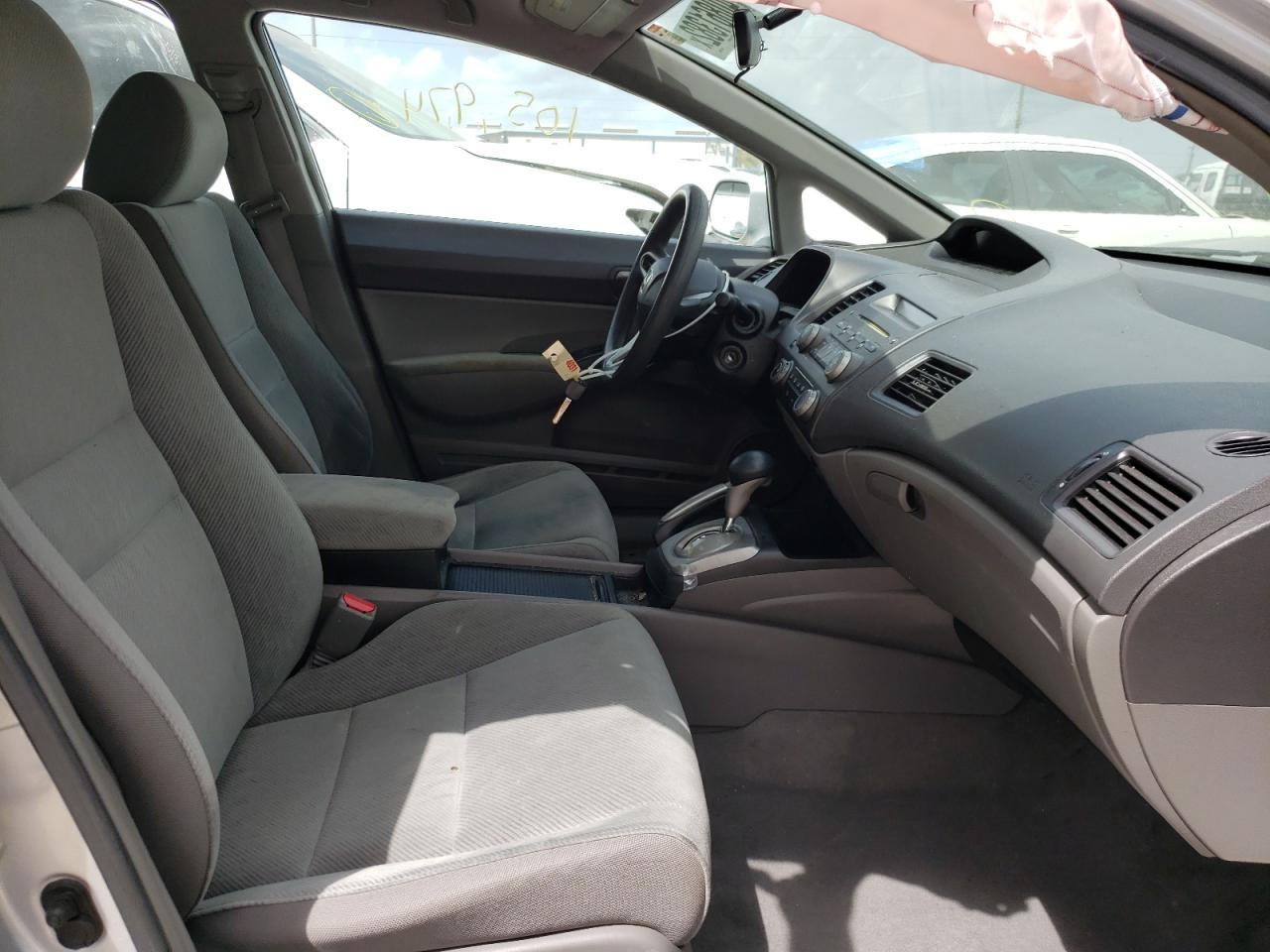 Photo 5 from auction – 2011 HONDA CIVIC LX with VIN 19XFA1F54BE010556