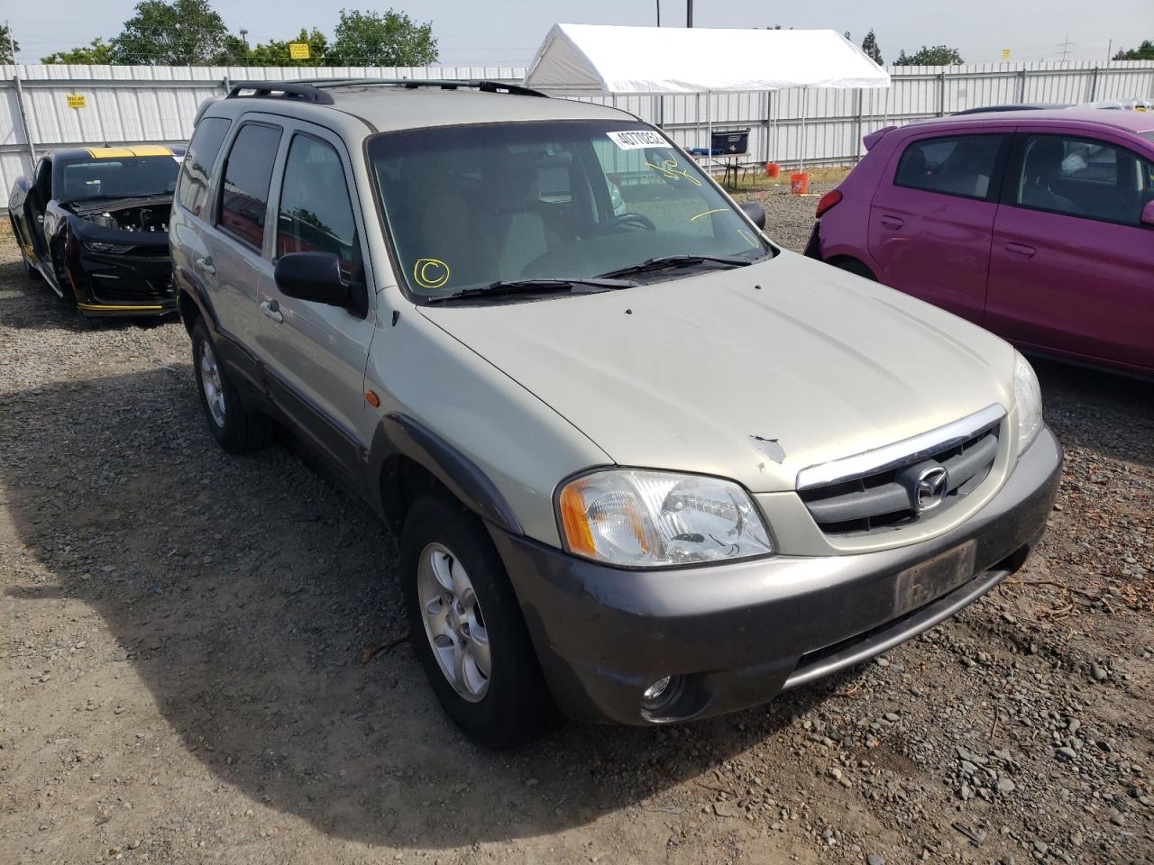MAZDA TRIBUTE LX 2003 with VIN 4F2YZ04153KM24729 - Photo from auction