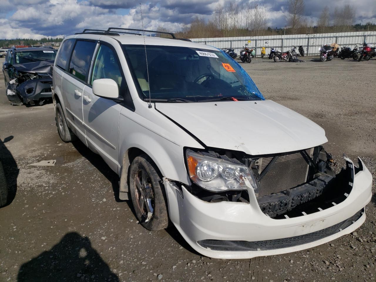 DODGE GRAND CARA 2011 with VIN 2D4RN3DG5BR680538 - Photo from auction