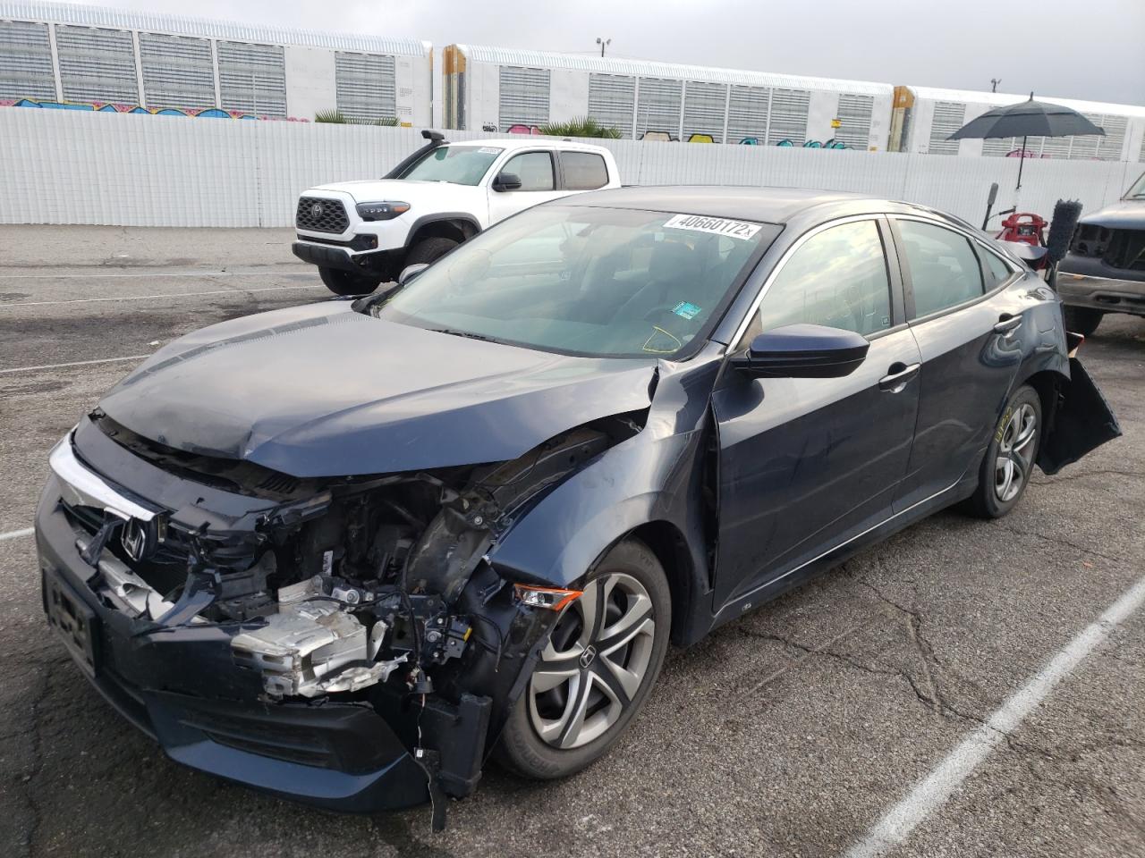 Photo 2 from auction – 2017 HONDA CIVIC LX with VIN 19XFC2F54HE207140