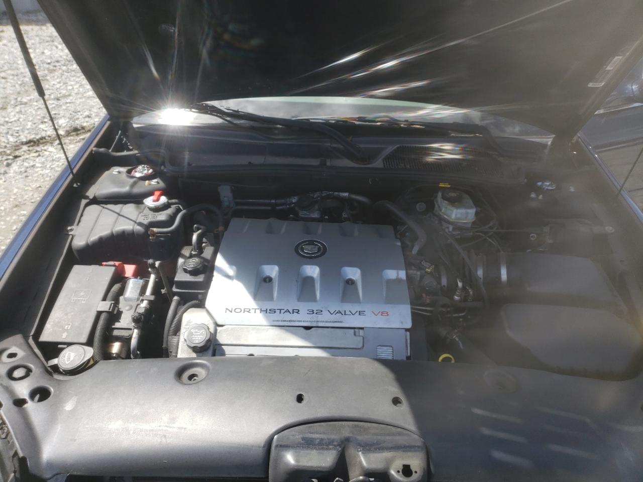 Photo 7 from auction – 2003 CADILLAC DEVILLE with VIN 1G6KD54Y73U217104