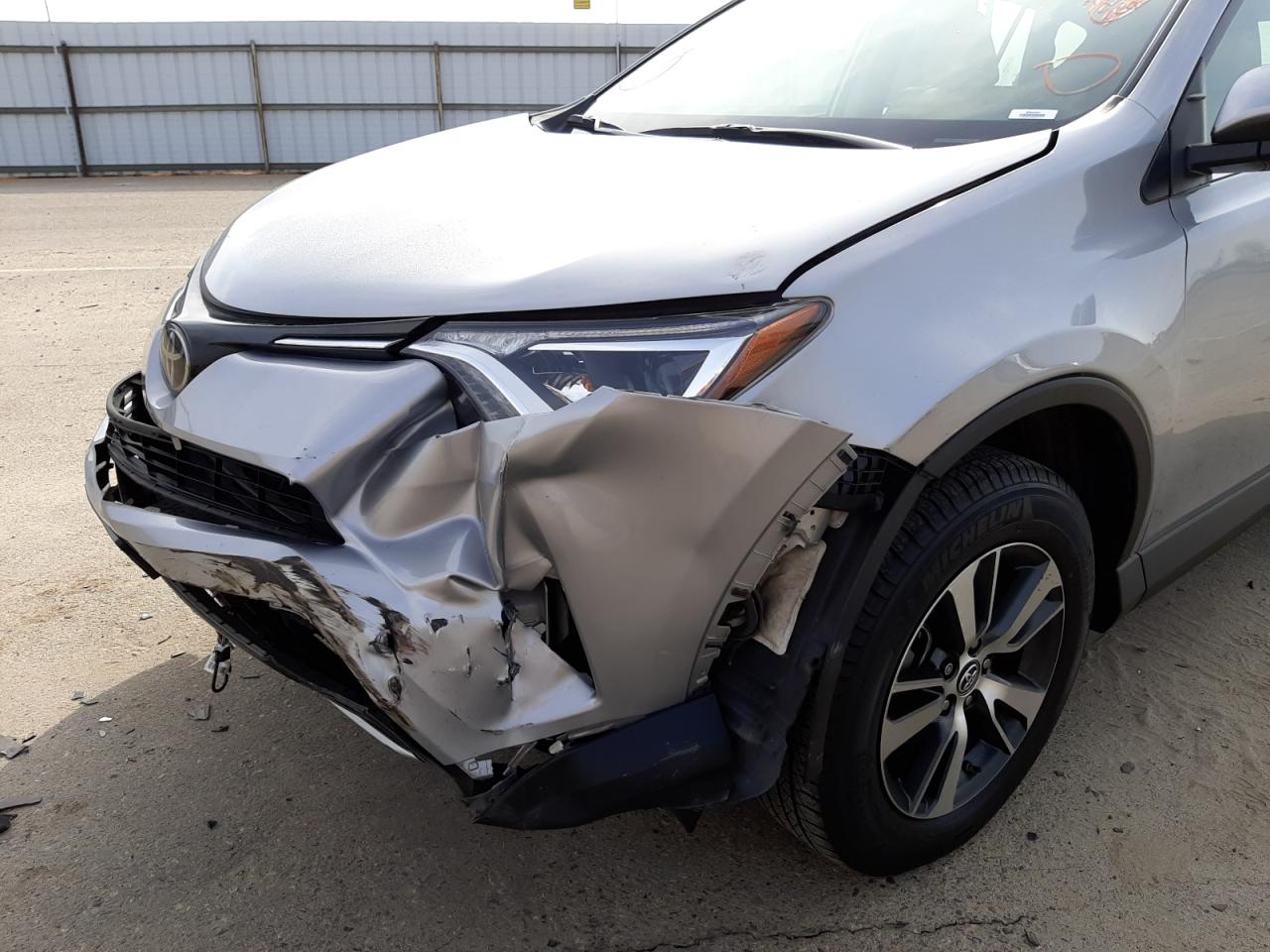 Photo 9 from auction – 2018 TOYOTA RAV4 ADVEN with VIN 2T3RFREV7JW709598