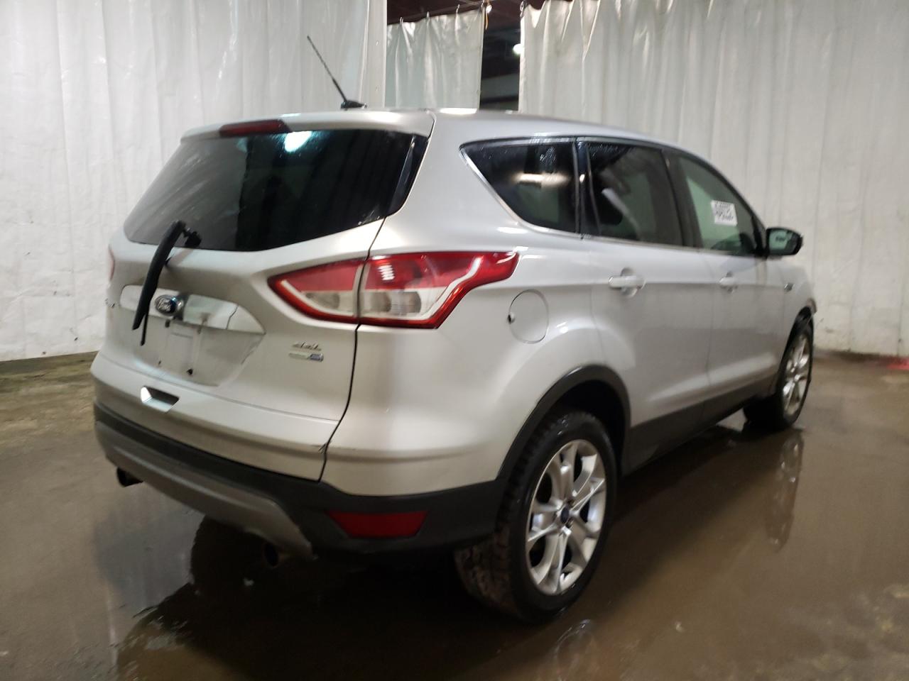Photo 4 from auction – 2013 FORD ESCAPE SEL with VIN 1FMCU9H92DUD40530