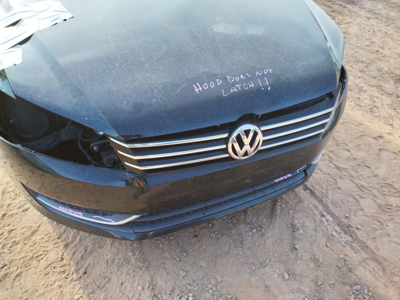 Photo 9 from auction – 2014 VOLKSWAGEN PASSAT SE with VIN 1VWBP7A3XEC007255