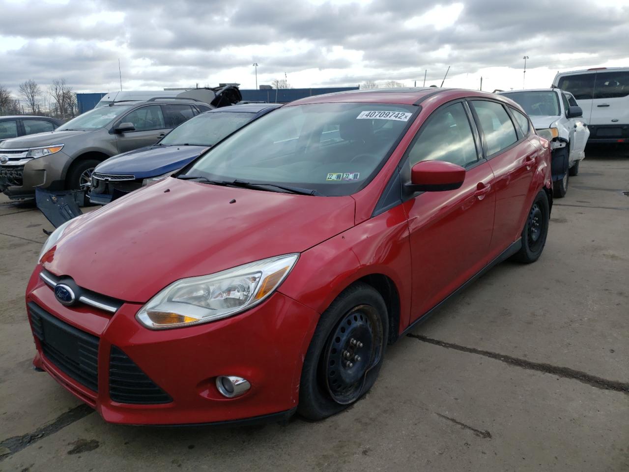 Photo 2 from auction – 2012 FORD FOCUS SE with VIN 1FAHP3K22CL117358