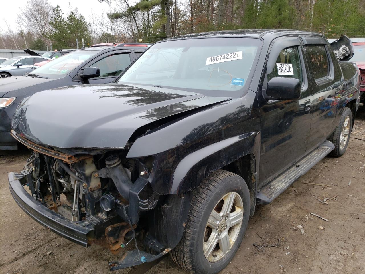 Photo 2 from auction – 2010 HONDA RIDGELINE with VIN 5FPYK1F58AB006452