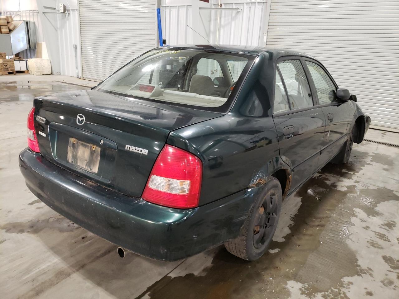 Photo 4 from auction – 1999 MAZDA PROTEGE DX with VIN JM1BJ2224X0160196
