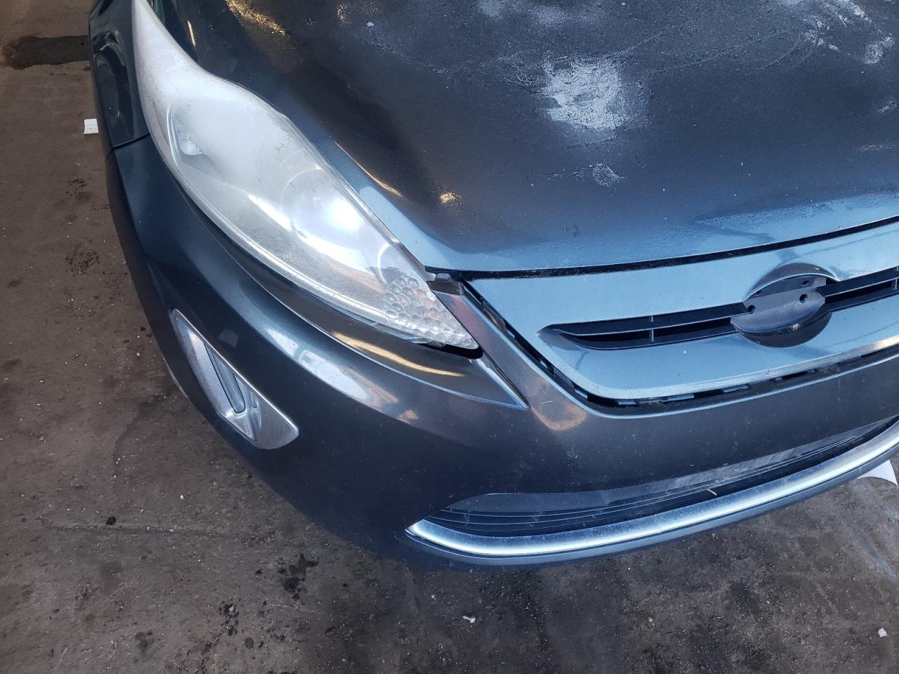 Photo 9 from auction – 2011 FORD FIESTA SES with VIN 3FADP4FJ1BM233699