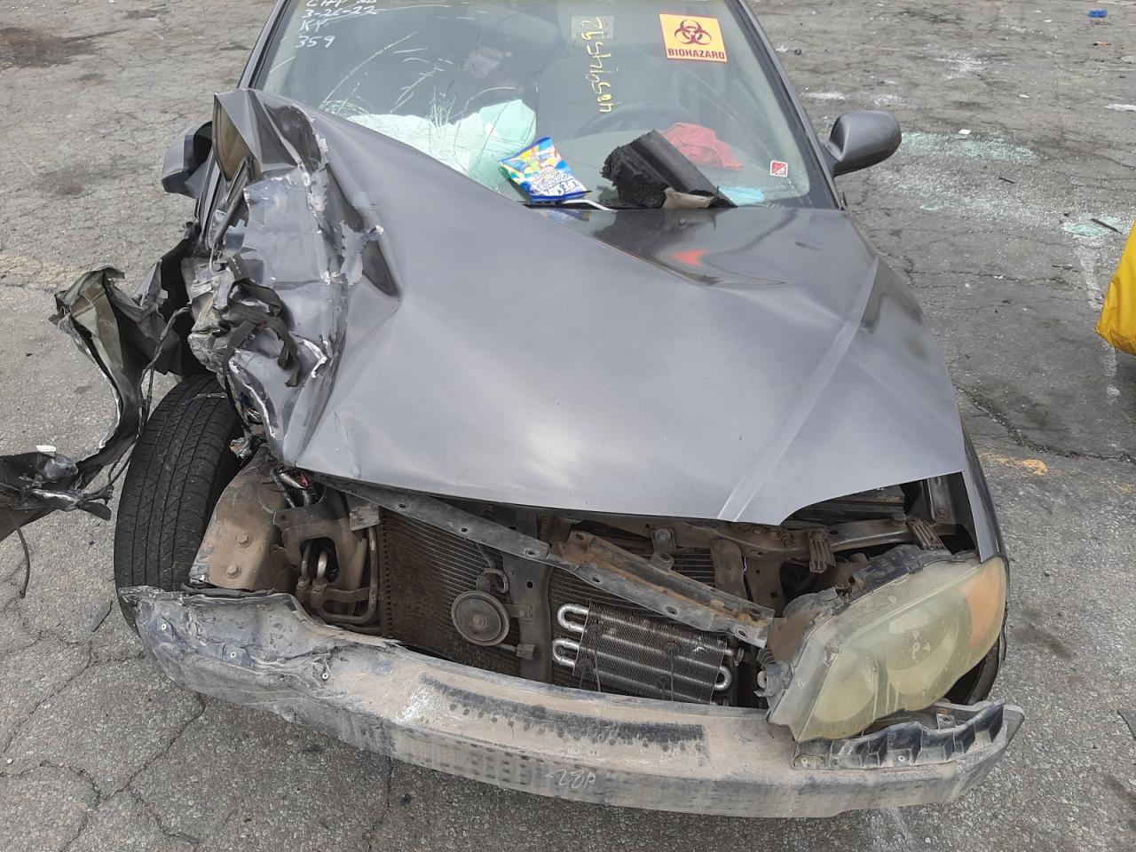 Photo 7 from auction – 2002 KIA SPECTRA GS with VIN KNAFB161425062062