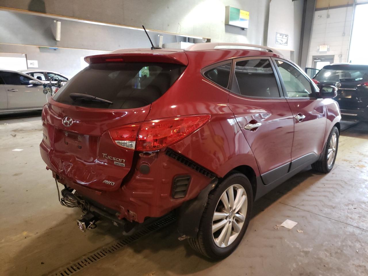 Photo 4 from auction – 2011 HYUNDAI TUCSON with VIN KM8JUCAC5BU310977