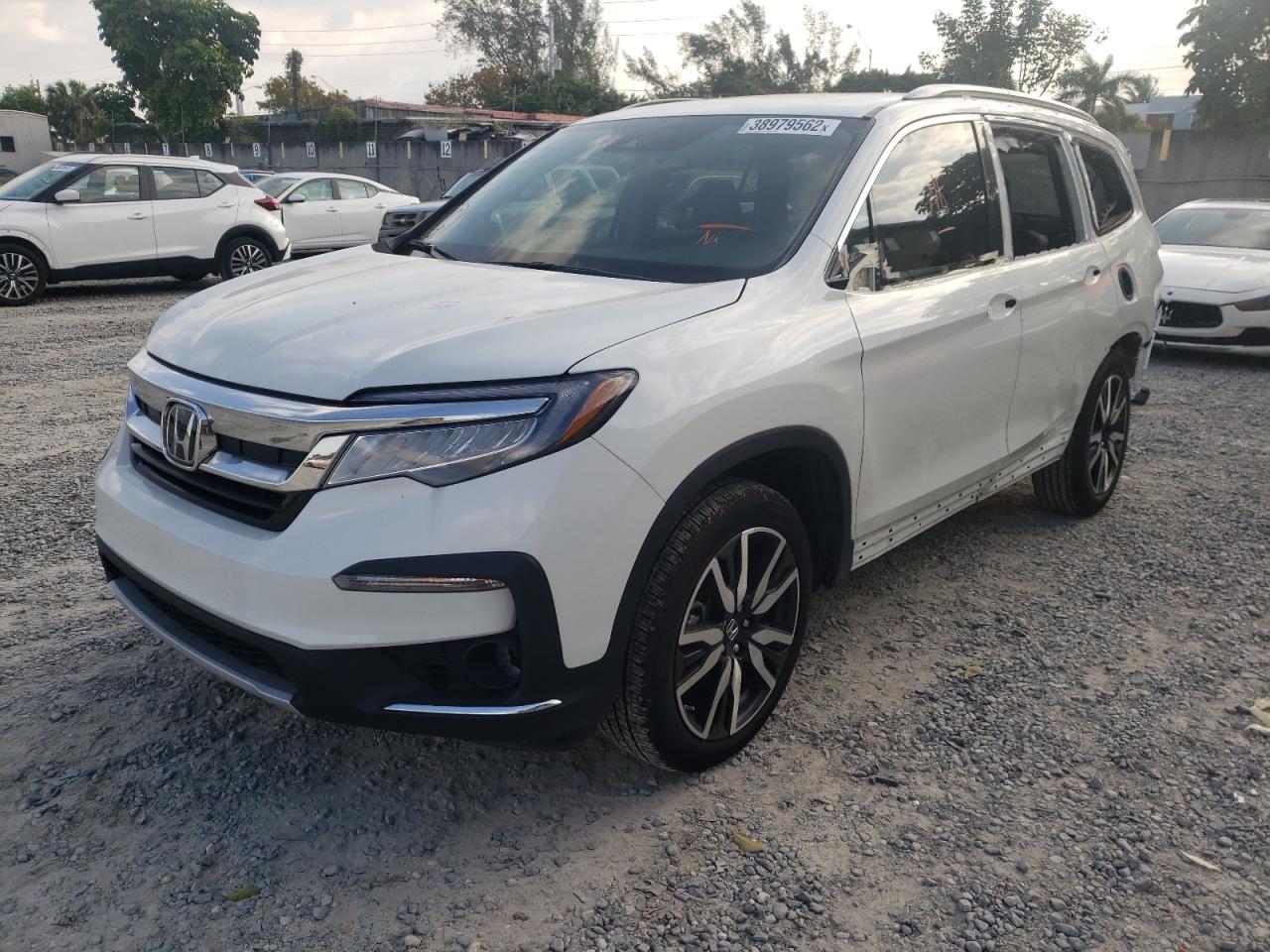 Photo 2 from auction – 2021 HONDA PILOT TOUR with VIN 5FNYF5H60MB043896